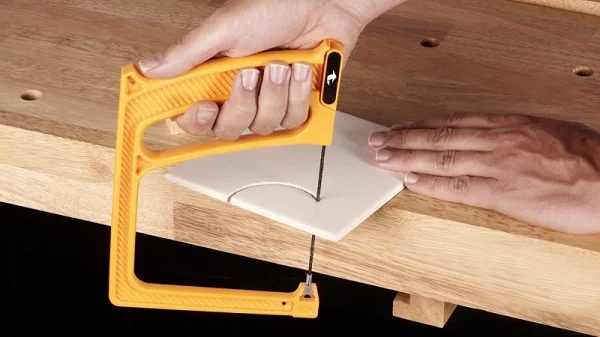 резка плитки ручным лобзиком резка плитки ручным лобзиком